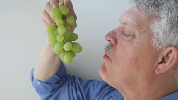 Profile View Man Eating Fresh Grapes Bunch — Stock Video