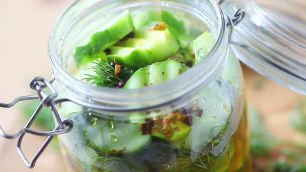 Pouring Brine Glass Jar Cucumber Slices — Stock Video