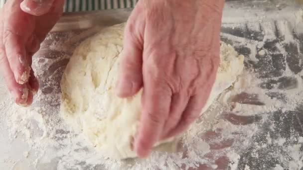 Man Folds Mixes Sticky Dough Floured Surface — Stock Video