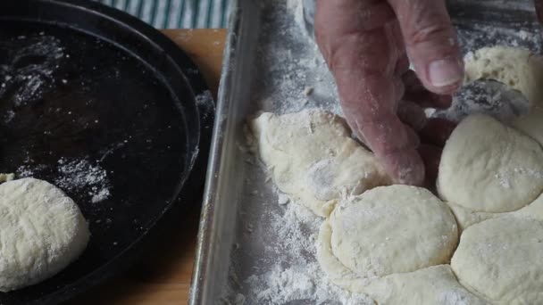 Man Places Raw Biscuits Baking Pan — Stock Video