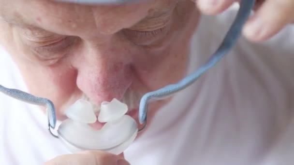Closeup Senior Man Putting Headgear Cpap Machine Treat Sleep Apnea — Stock Video
