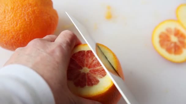 Woman Cuts Away Peel Part Pith Caracara Orange — Stock Video