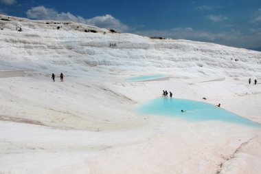 Pamukkale - cotton castle, Denizli Province in southwestern Turkey. Area is famous for a white carbonate mineral left by flowing water clipart