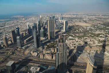 Birleşik Arap Emirlikleri, Dubai, 31 Ocak 2016: Görünüm Dubai downtown Burj Khalifa'nın gökdelenin 125 yerden. En iyi Uluslararası Dubai Kongre ve Sergi Sarayı, Birleşik Arap Emirlikleri, Basra Körfezi, Arap Yarımadası'nda, Orta Doğu