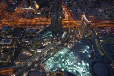 Birleşik Arap Emirlikleri, Dubai, 31 Ocak 2016:, Dubai downtown Burj Khalifa'nın gökdelenin 125 kat üzerinden akşam üzerinde görünümü. En iyi Uluslararası Dubai Kongre ve Sergi Sarayı, Birleşik Arap Emirlikleri, Basra Körfezi, Arap Yarımadası'nda, Orta Doğu