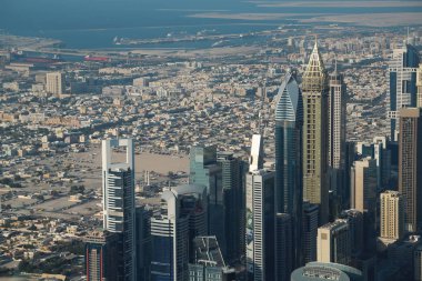 Birleşik Arap Emirlikleri, Dubai, 31 Ocak 2016: Görünüm Dubai downtown Burj Khalifa'nın gökdelenin 125 yerden. En iyi Uluslararası Dubai Kongre ve Sergi Sarayı, Birleşik Arap Emirlikleri, Basra Körfezi, Arap Yarımadası'nda, Orta Doğu