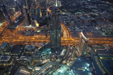 Birleşik Arap Emirlikleri, Dubai, 31 Ocak 2016:, Dubai downtown Burj Khalifa'nın gökdelenin 125 kat üzerinden akşam üzerinde görünümü. En iyi Uluslararası Dubai Kongre ve Sergi Sarayı, Birleşik Arap Emirlikleri, Basra Körfezi, Arap Yarımadası'nda, Orta Doğu