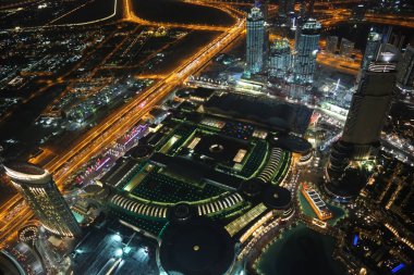 Birleşik Arap Emirlikleri, Dubai, 31 Ocak 2016:, Dubai downtown Burj Khalifa'nın gökdelenin 125 kat üzerinden akşam üzerinde görünümü. En iyi Uluslararası Dubai Kongre ve Sergi Sarayı, Birleşik Arap Emirlikleri, Basra Körfezi, Arap Yarımadası'nda, Orta Doğu