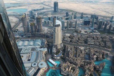 Birleşik Arap Emirlikleri, Dubai, 31 Ocak 2016: Görünüm Dubai downtown Burj Khalifa'nın gökdelenin 125 yerden. En iyi Uluslararası Dubai Kongre ve Sergi Sarayı, Birleşik Arap Emirlikleri, Basra Körfezi, Arap Yarımadası'nda, Orta Doğu
