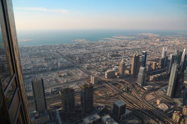 Birleşik Arap Emirlikleri, Dubai, 31 Ocak 2016: Görünüm Dubai downtown Burj Khalifa'nın gökdelenin 125 yerden. En iyi Uluslararası Dubai Kongre ve Sergi Sarayı, Birleşik Arap Emirlikleri, Basra Körfezi, Arap Yarımadası'nda, Orta Doğu