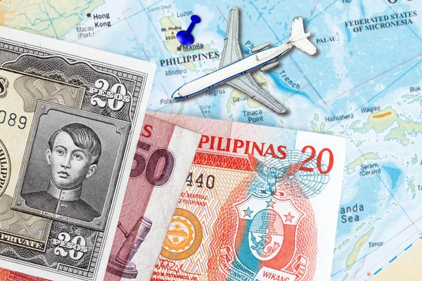 Travel to Philippines concept- with  map of the Philippines and peso currency