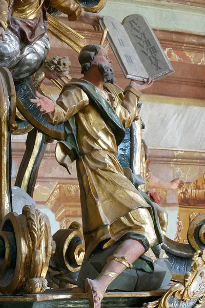 Moses receiving the 10 commandments statue on the altar in the Baroque Church of Our Lady of the Snow in Belec, Croatia