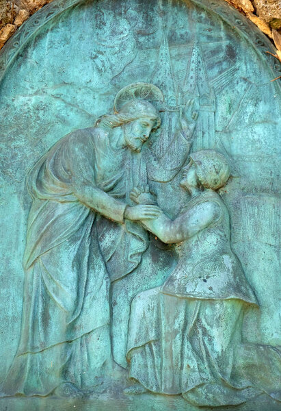 Detail of a mourning sculpture on a Mirogoj cemetery, Zagreb, Croatia 