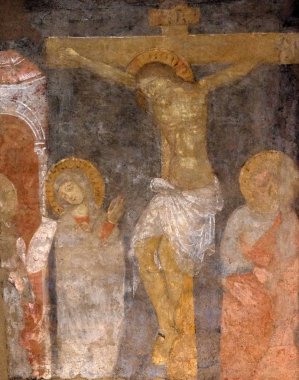 Çarmıha germe, Meryem Ana nd Saint John haç altında fresco resmi bulunan bir rahiplik Basilica of Saint Frediano, Lucca, Toskana, İtalya