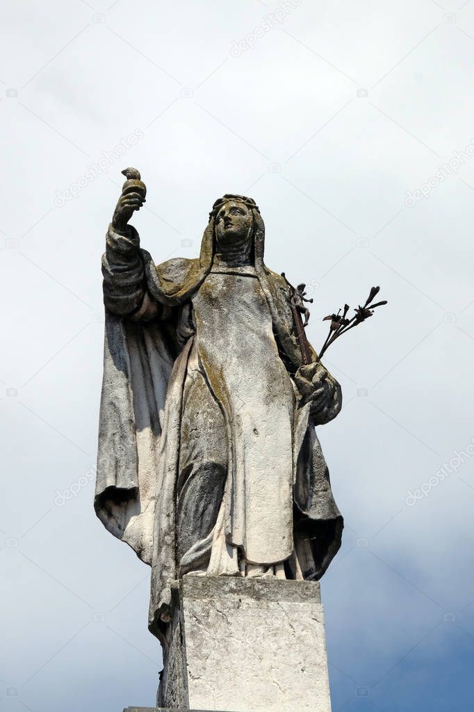 Saint Catherine of Siena, statue on facade of the Mantua Cathedral dedicated to Saint Peter, Mantua, Italy 