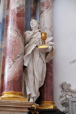 Saint John Evangelist heykel Benedictine Manastırı Kilisesi Amorbach, Almanya'da sunak üzerinde 