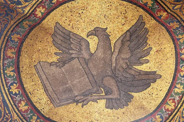 Symbol of Saint John the Evangelist, mosaic from facade of the Basilica San Marco, St. Mark\'s Square, Venice, Italy, UNESCO World Heritage Site