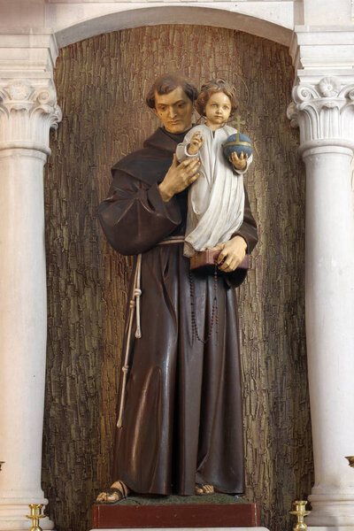 Saint Anthony of Padua holding baby Jesus, altar in the Church of Saint Roch in Lumbarda, Korcula island, Croatia