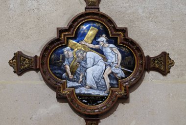 5th Stations of the Cross, Simon of Cyrene carries the cross, St Francis Xavier's Church in Paris, France clipart