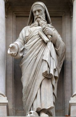Prophet Ezekiel, statue on the facade of Saint Augustine church in Paris, France  clipart