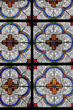 Stained glass window in the Saint Augustine church in Paris, France  clipart