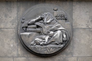 Averroes, was a medieval Andalusian polymath. He wrote on logic, philosophy, medieval sciences of medicine, astronomy, physics. Stone relief at the building of the Faculte de Medicine Paris. clipart