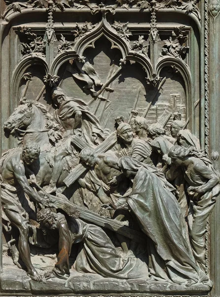 The death sentence and the way to the Calvary of Jesus Christ, detail of the main bronze door of the Milan Cathedral, Duomo di Santa Maria Nascente, Milan, Lombardy, Italy