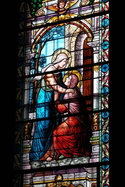 ルガーノ スイスのセント ローレンスの大聖堂のステンド グラスの窓 聖母マリアの訪問 — ストック写真