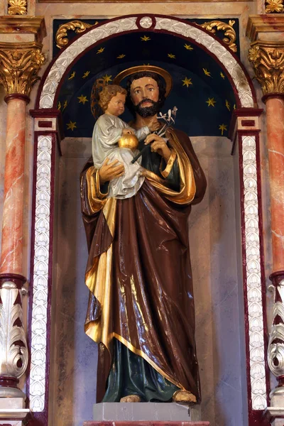 Άγιος Ιωσήφ Κρατώντας Μωρό Ιησού Άγαλμα Στο Βωμό Του Αγίου — Φωτογραφία Αρχείου
