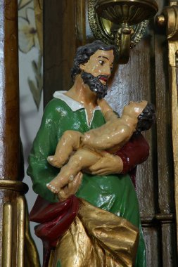 Saint Joseph bebek İsa tutan, Bedenica All Saints Kilisesi'nde ana sunak üzerinde heykeli, Hırvatistan