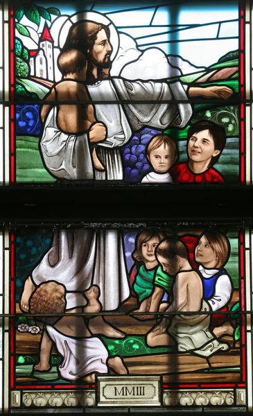 Jesus the Friend of the Children stained-glass window in the church of St John the Baptist in Sveti Ivan Zabno, Croatia
