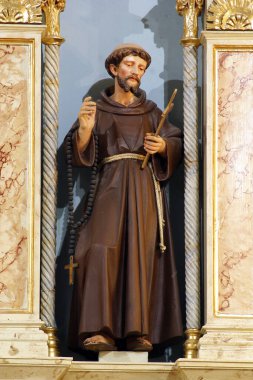 Saint Francis of Assisi, statue on the main altar in the parish church of the Holy Trinity in Donja Stubica, Croatia clipart