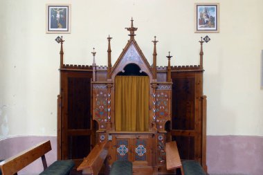 Confessionals in the parish church of St. Stephen the King in Hercegovac, Croatia clipart