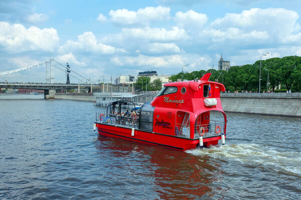 Pleasure boat with tourists on Moscow River 
