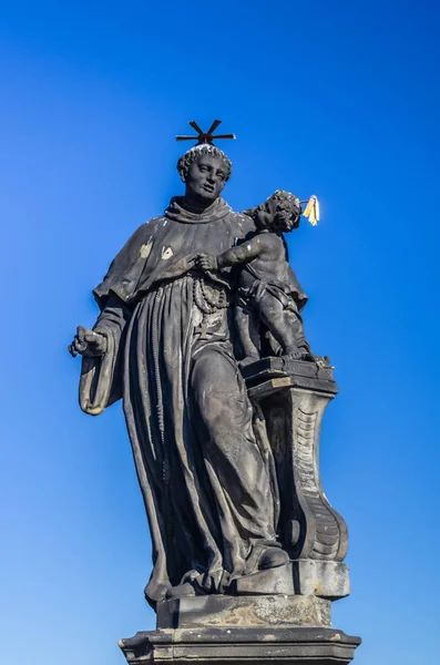 Statue on Chales Bridge in Prague — Stock Photo, Image