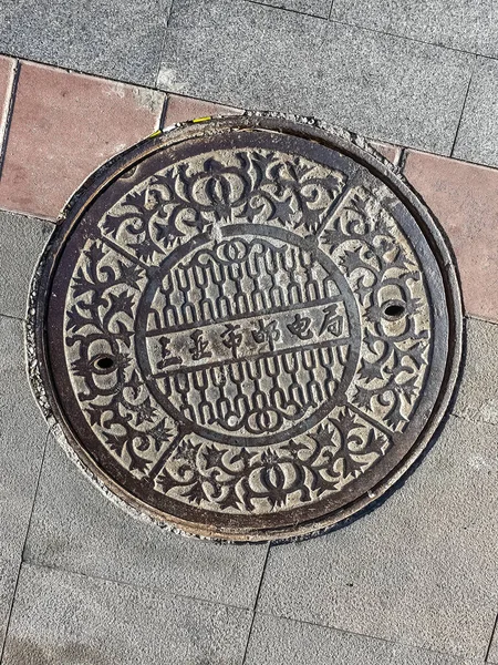 Closeup View Hatch Lettering Electrical Power Lines Paving Road Sanya — Stock Photo, Image