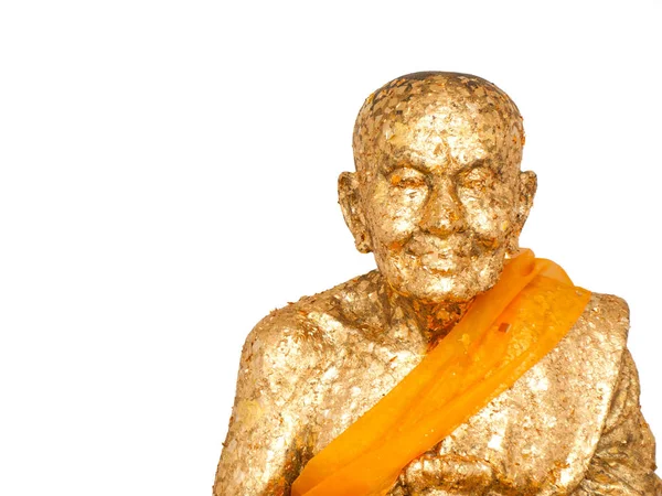 Gold Leaf sheets attached to the Buddha statue isolated from Huay Mongkol Temple, Thailand on white background.
