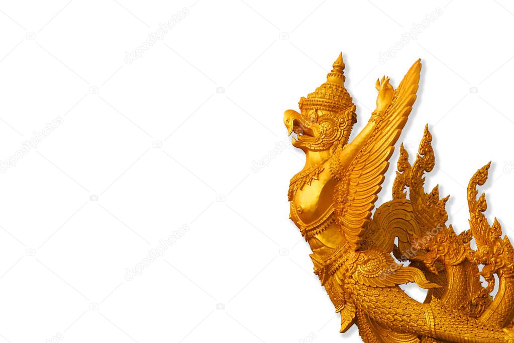 Statue of a golden garuda images, Candle Garuda statue, Giant statues on a white background from Bangkok temple, Thailand.