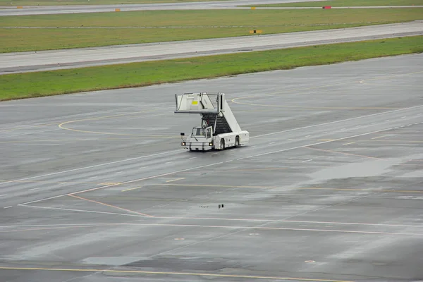 Airport movable ramp. Car ramps driving across the airfield