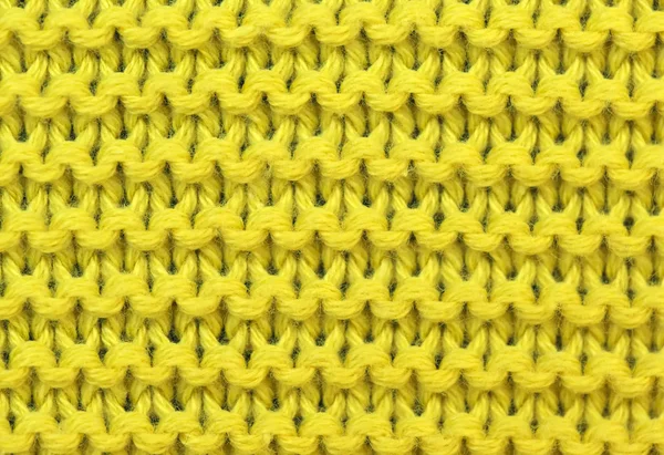 Yellow background of knitted — Stock Photo, Image