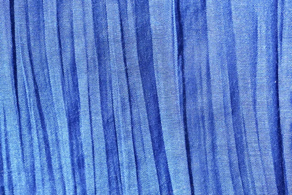 蓝色背景织品 — 图库照片