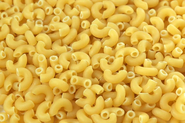 Raw wheat pasta close up — Stock Photo, Image