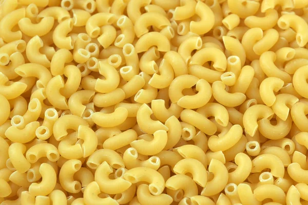 Rauwe tarwe pasta close-up — Stockfoto
