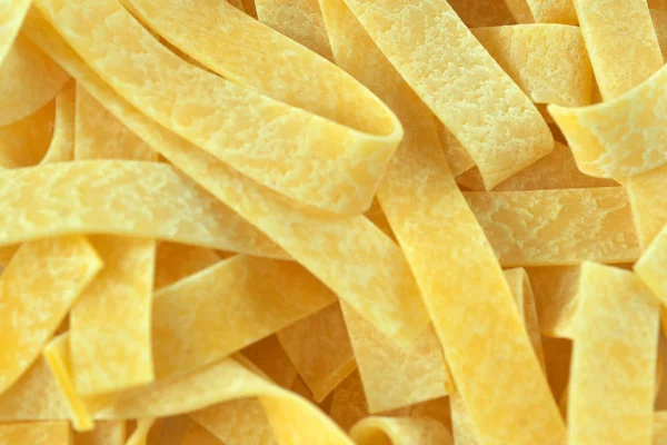 Raw wheat pasta close up — Stock Photo, Image
