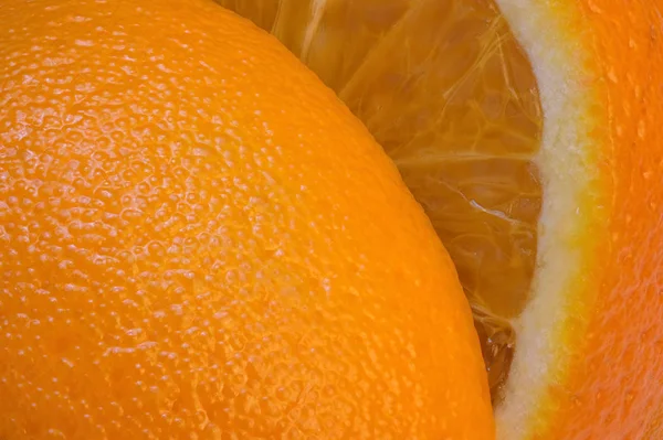 スライスされたオレンジ柑橘類の背景 — ストック写真