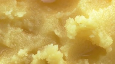 Market videosu tatlı arka plan ışığı kamera makro çekiminin önünde bal döndürebilir 