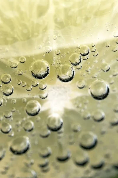 Bir Bardak Soda Limon Dilimleri Yakın Çekim Makro Fotoğrafçılık Ürünü — Stok fotoğraf