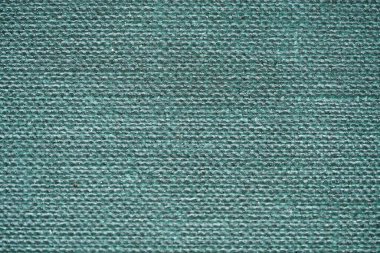 Zarar ve kirli makro fotoğrafçılık izleri olan eski bir kitabın yeşil desenli arka plan ciltleri