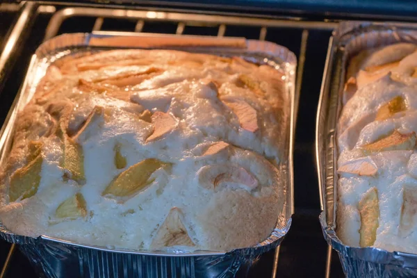 Delicious apple pie baked in the oven of a gas oven close-up macro photography