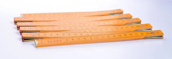 Yellow carpenter's ruler — Stock Photo, Image